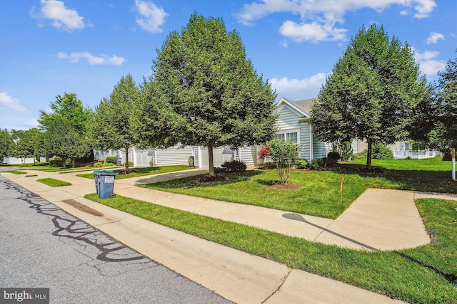 130 Ambrose Ln, Fredericksburg, VA 22406 - view of property hidden behind natural elements with a front yard and driveway