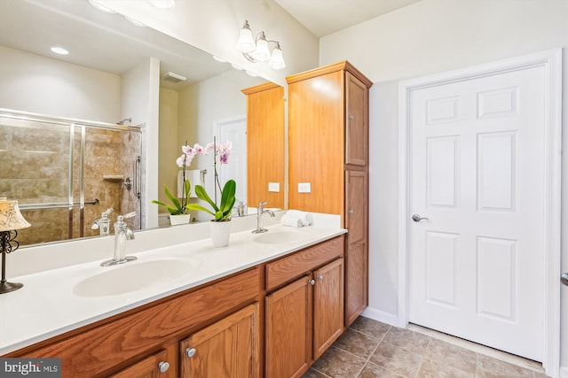 130 Ambrose Ln, Fredericksburg, VA 22406 - bathroom featuring double vanity and tiled shower