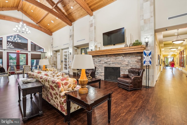 130 Ambrose Ln, Fredericksburg, VA 22406 - living area featuring high vaulted ceiling, hardwood / wood-style floors, a stone fireplace, a wooden ceiling with exposed beams, and a chandelier