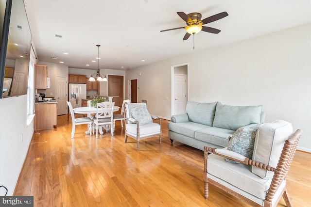 130 Ambrose Ln, Fredericksburg, VA 22406 - living room featuring light wood finished floors, a ceiling fan, a chandelier, and recessed lighting