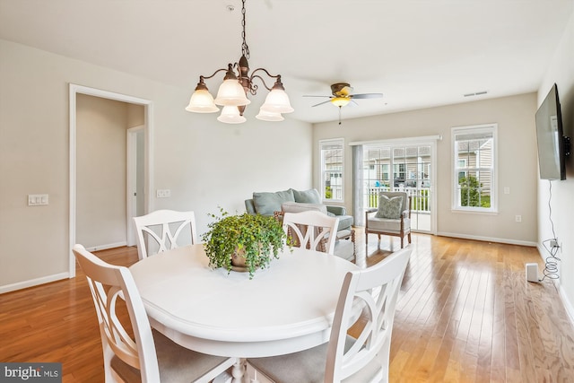 130 Ambrose Ln, Fredericksburg, VA 22406 - dining area featuring light wood finished floors, a ceiling fan, and a chandelier