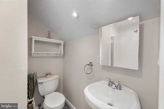 2619 Poplar Dr, Baltimore, MD 21207 - bathroom featuring a sink and lofted ceiling
