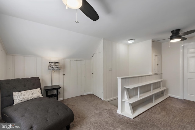 2619 Poplar Dr, Baltimore, MD 21207 - living area featuring a ceiling fan, carpet flooring, vaulted ceiling, and a decorative wall