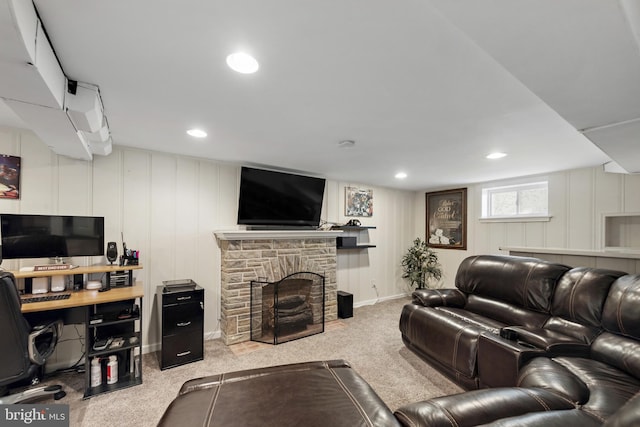 2619 Poplar Dr, Baltimore, MD 21207 - living room with carpet floors, a stone fireplace, a decorative wall, and recessed lighting