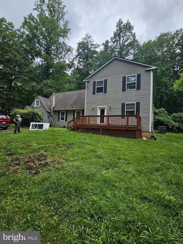 2914 Hunter Rd, Fairfax, VA 22031 - rear view of house featuring a deck, a lawn, and view of scattered trees