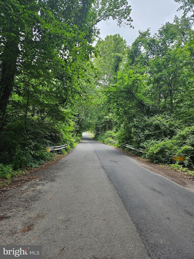 2914 Hunter Rd, Fairfax, VA 22031 - view of asphalt street featuring a wooded view
