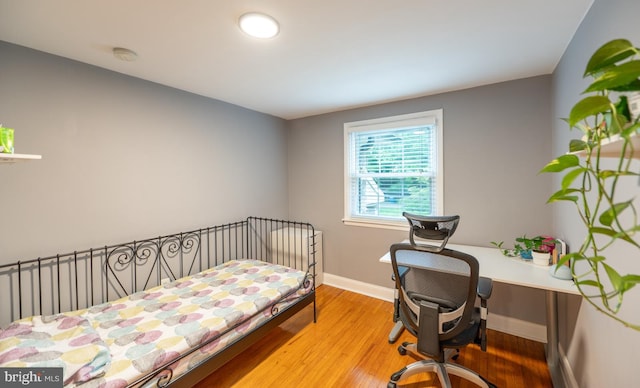 496 Black Swan Ln, Berwyn, PA 19312 - bedroom with light wood-type flooring and an office area