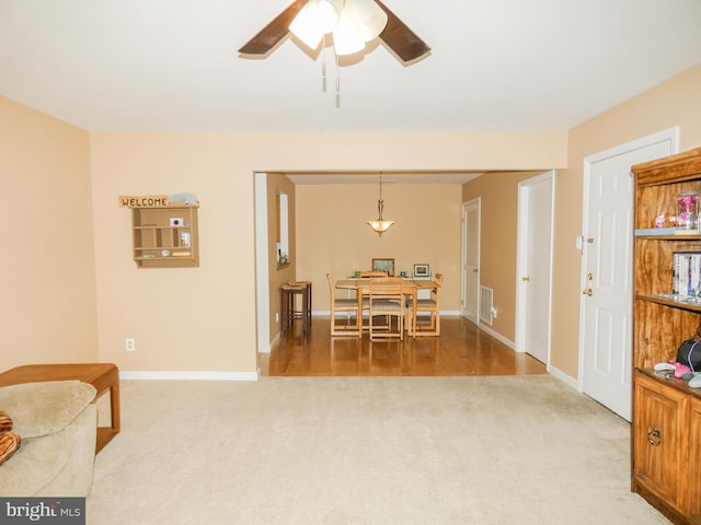 445 Locust Ave Unit 5203, Pitman, NJ 08071 - carpeted dining room with ceiling fan and baseboards