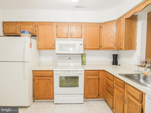 445 Locust Ave Unit 5203, Pitman, NJ 08071 - kitchen with white appliances, light countertops, and light tile patterned flooring