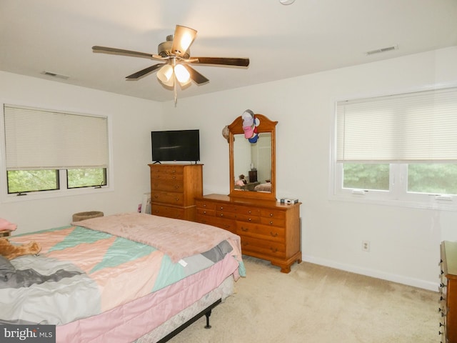445 Locust Ave Unit 5203, Pitman, NJ 08071 - bedroom with multiple windows, light colored carpet, and a ceiling fan