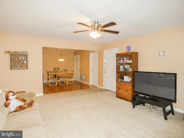 445 Locust Ave Unit 5203, Pitman, NJ 08071 - carpeted living room with ceiling fan and baseboards