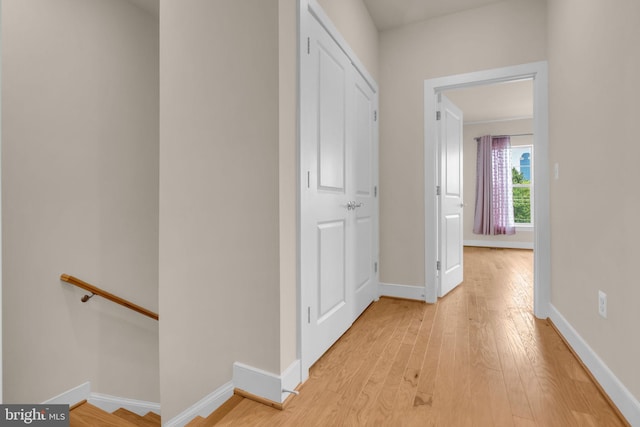 9660 Fields Rd Unit 9660, Gaithersburg, MD 20878 - hallway with an upstairs landing and light wood-type flooring