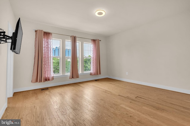 9660 Fields Rd Unit 9660, Gaithersburg, MD 20878 - unfurnished room featuring wood finished floors and baseboards