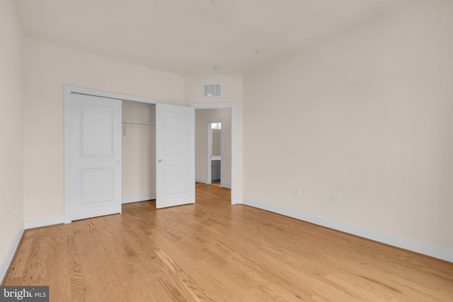 9660 Fields Rd Unit 9660, Gaithersburg, MD 20878 - unfurnished bedroom featuring light wood finished floors and a closet