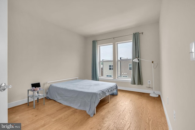 9660 Fields Rd Unit 9660, Gaithersburg, MD 20878 - bedroom with wood finished floors and baseboards