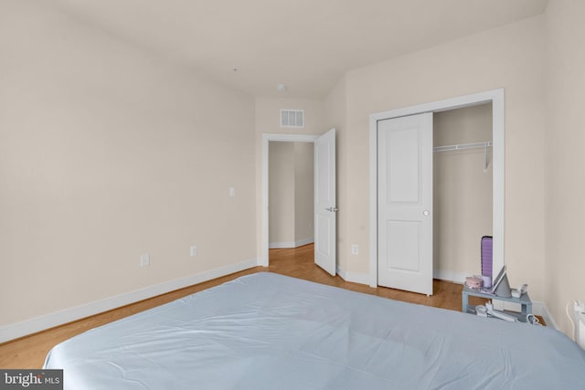 9660 Fields Rd Unit 9660, Gaithersburg, MD 20878 - bedroom featuring wood finished floors and a closet