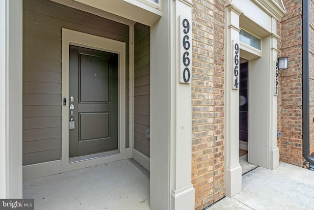 9660 Fields Rd Unit 9660, Gaithersburg, MD 20878 - view of exterior entry with brick siding