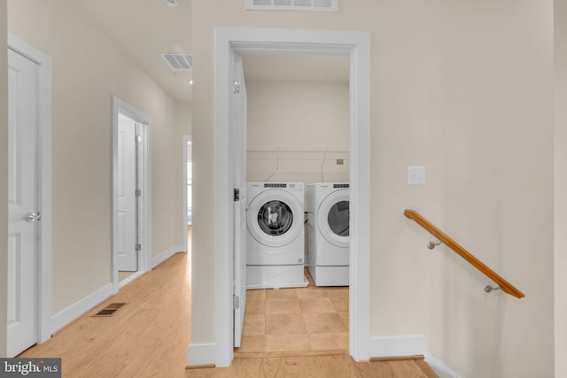 9660 Fields Rd Unit 9660, Gaithersburg, MD 20878 - laundry area with independent washer and dryer and wood finished floors