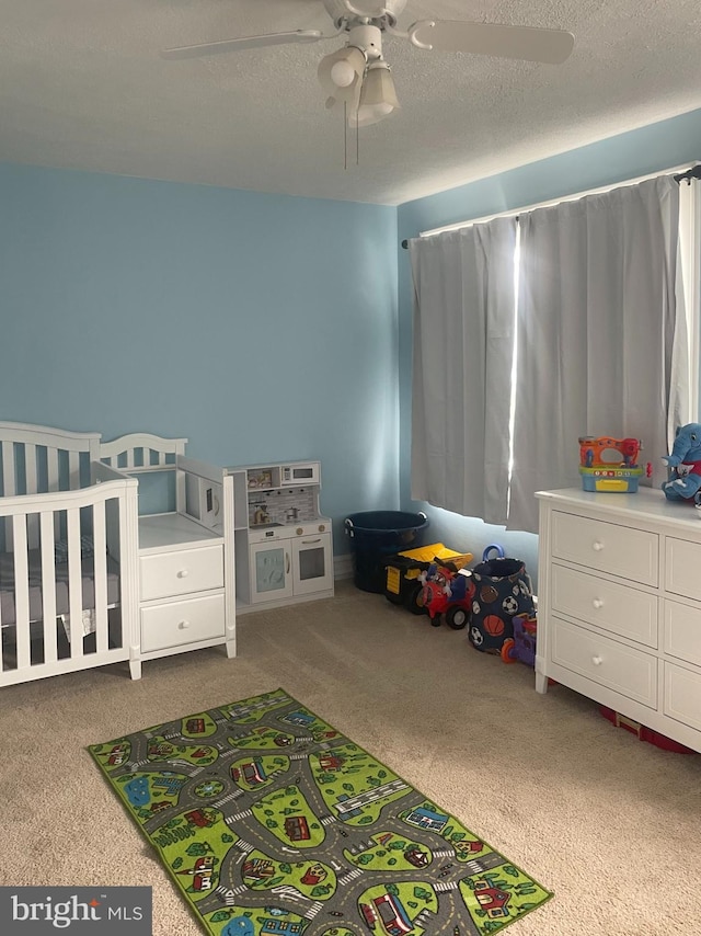 433 Williams St, Cumberland, MD 21502 - carpeted bedroom featuring a textured ceiling and a ceiling fan