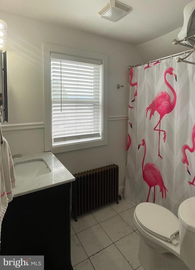 433 Williams St, Cumberland, MD 21502 - full bath with radiator, vanity, tile patterned floors, and curtained shower
