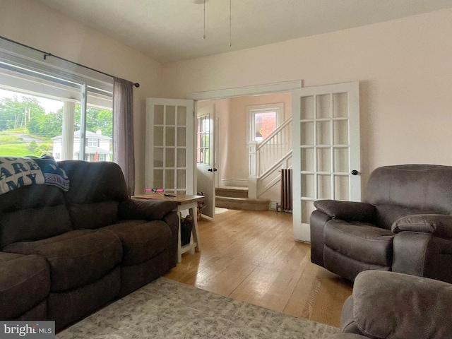 433 Williams St, Cumberland, MD 21502 - living room with light wood-type flooring and stairs