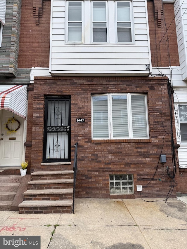 1447 S 28th St, Philadelphia, PA 19146 - property entrance featuring brick siding