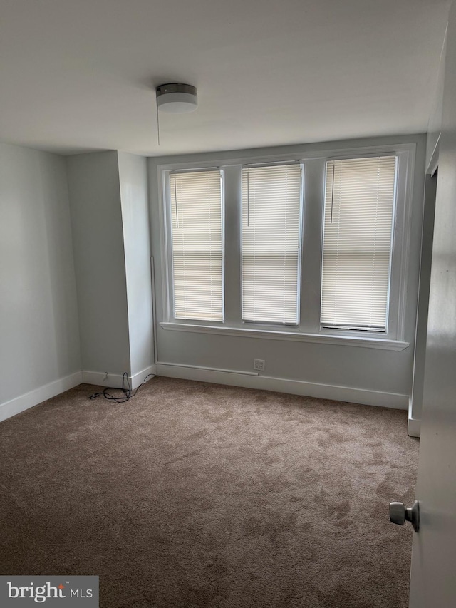 1447 S 28th St, Philadelphia, PA 19146 - unfurnished room featuring carpet floors and healthy amount of natural light