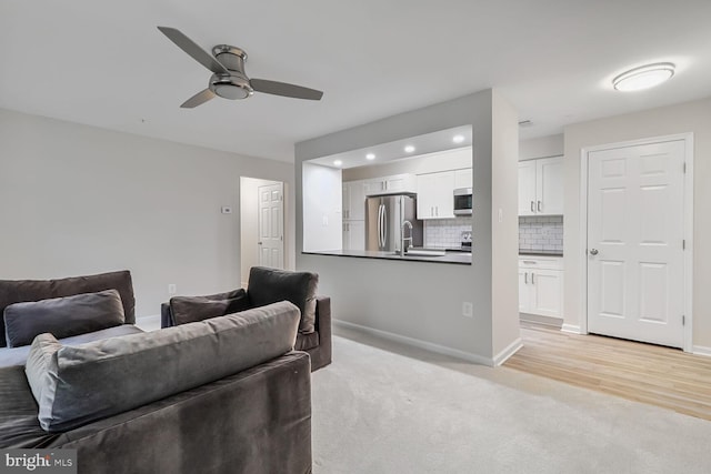 3121 Katewood Ct, Baltimore, MD 21209 - living room featuring ceiling fan, recessed lighting, and light colored carpet