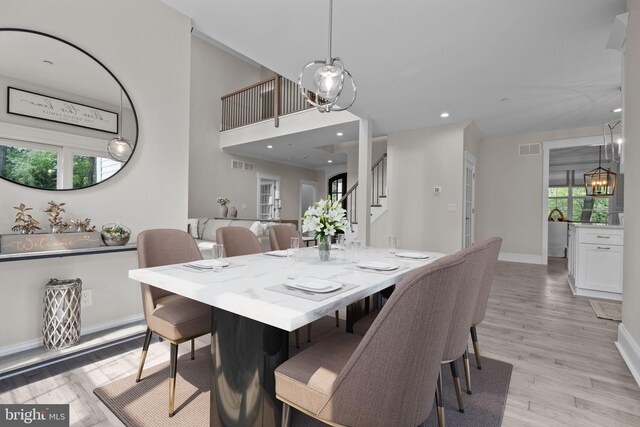 4245 Mechanicsville Rd, Doylestown, PA 18902 - dining space with stairway, light wood-type flooring, recessed lighting, and a chandelier