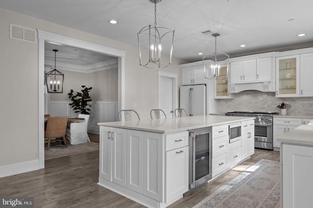 4245 Mechanicsville Rd, Doylestown, PA 18902 - kitchen featuring wine cooler, a chandelier, premium appliances, a center island, and light countertops