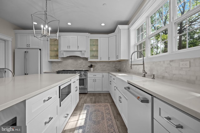 4245 Mechanicsville Rd, Doylestown, PA 18902 - kitchen with premium appliances, recessed lighting, light countertops, a chandelier, and tasteful backsplash
