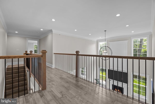 4245 Mechanicsville Rd, Doylestown, PA 18902 - hallway with ornamental molding, recessed lighting, a chandelier, wood finished floors, and an upstairs landing