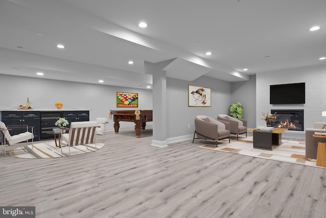 4245 Mechanicsville Rd, Doylestown, PA 18902 - living area with light wood-type flooring, recessed lighting, pool table, a large fireplace, and bar