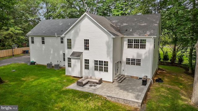 4245 Mechanicsville Rd, Doylestown, PA 18902 - rear view of property featuring a patio, a shingled roof, and view of scattered trees