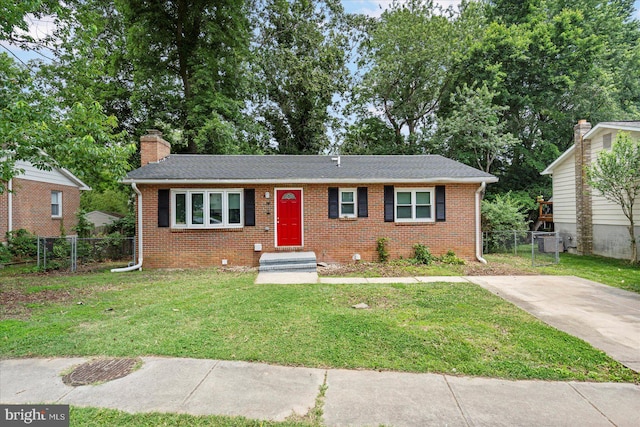105 Concove Way, Havre De Grace, MD 21078 - view of front facade featuring brick siding, a chimney, and roof with shingles