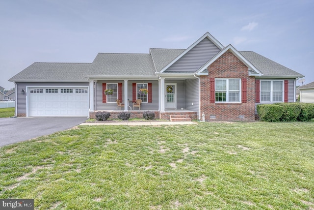 132 Nightingale Dr, Milford, DE 19963 - view of front facade with covered porch, asphalt driveway, an attached garage, a front yard, and roof with shingles