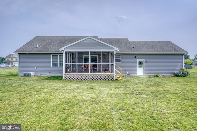 132 Nightingale Dr, Milford, DE 19963 - rear view of house with a sunroom, a lawn, and roof with shingles