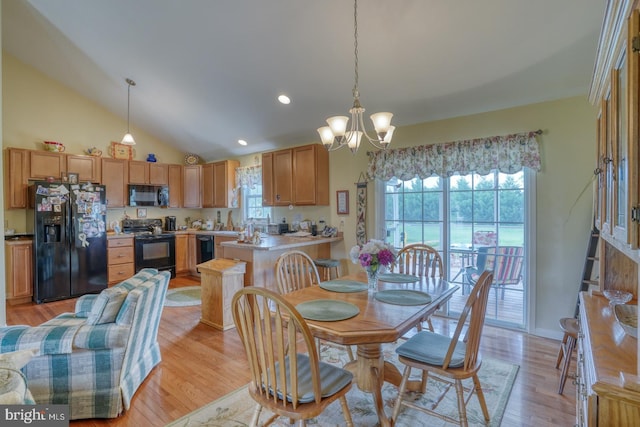 132 Nightingale Dr, Milford, DE 19963 - dining room featuring a chandelier, light wood-style flooring, vaulted ceiling, and recessed lighting