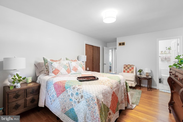 5114 14th St N, Arlington, VA 22205 - bedroom with wood finished floors and a closet