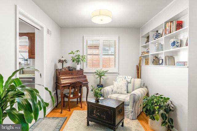 5114 14th St N, Arlington, VA 22205 - living area featuring light wood finished floors and baseboards