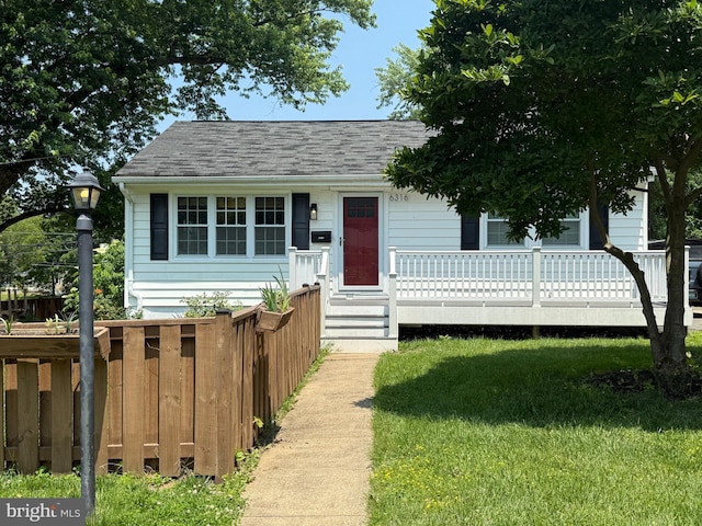 6316 Gentele Ct, Alexandria, VA 22310 - view of front of house with a front lawn and roof with shingles