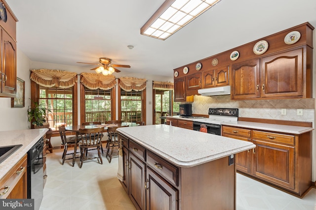12810 Kending Ln, Clear Spring, MD 21722 - kitchen with range with electric stovetop, under cabinet range hood, light flooring, ceiling fan, and black dishwasher