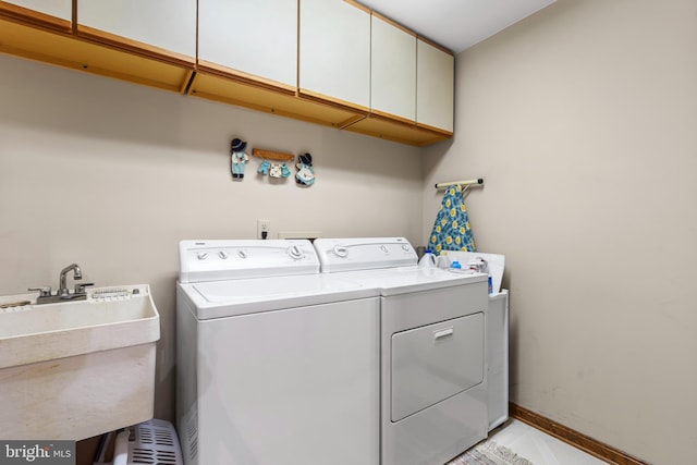 12810 Kending Ln, Clear Spring, MD 21722 - laundry area with cabinet space and independent washer and dryer