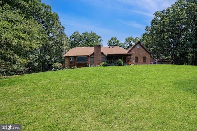 12810 Kending Ln, Clear Spring, MD 21722 - ranch-style home with brick siding, a front yard, and a chimney