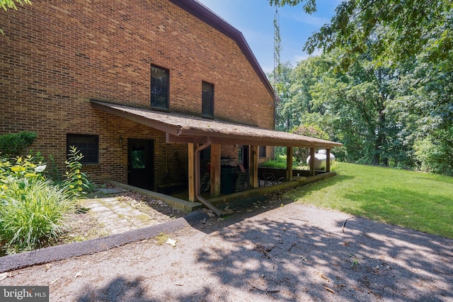 12810 Kending Ln, Clear Spring, MD 21722 - view of home's exterior featuring a lawn and brick siding