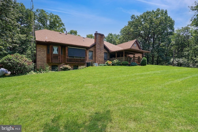12810 Kending Ln, Clear Spring, MD 21722 - view of front of property featuring a front lawn, a chimney, and brick siding