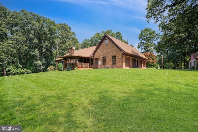 12810 Kending Ln, Clear Spring, MD 21722 - rear view of property featuring a yard, brick siding, and a chimney
