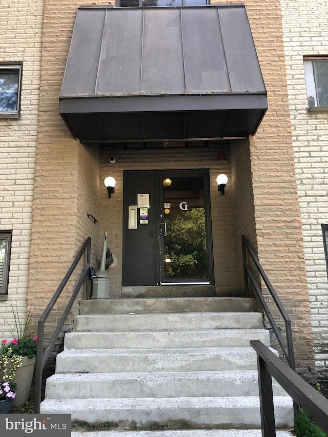 400 Glendale Rd Unit G-13, Havertown, PA 19083 - doorway to property featuring brick siding