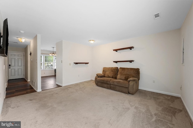 208 Kimberly Way, Winchester, VA 22601 - living area with carpet floors and a chandelier