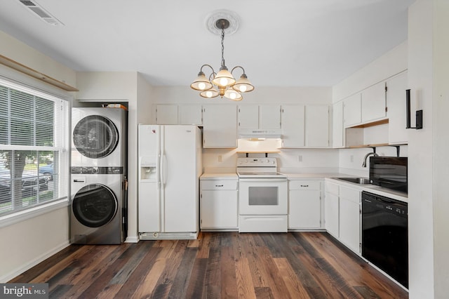 208 Kimberly Way, Winchester, VA 22601 - kitchen with white appliances, stacked washer / drying machine, under cabinet range hood, a chandelier, and light countertops